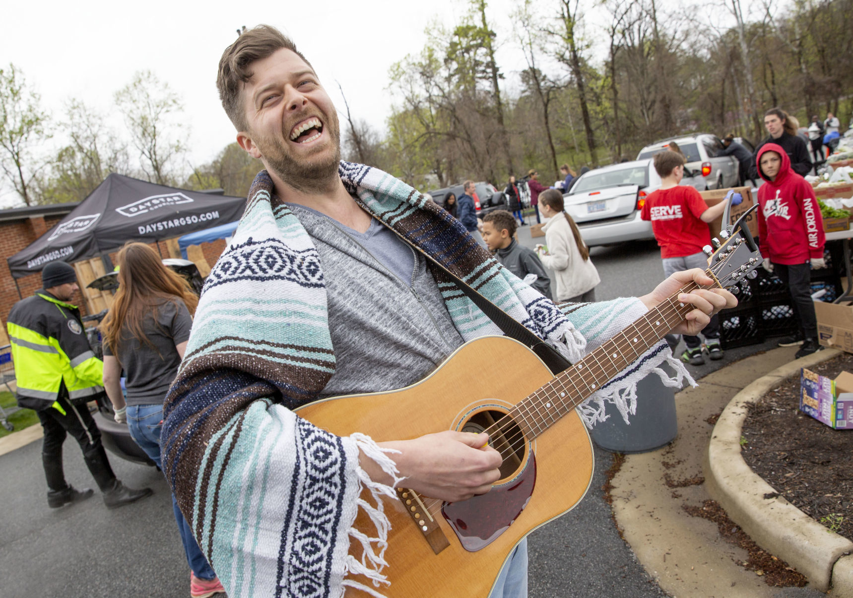 Crowds flock to produce giveaway at Daystar Church